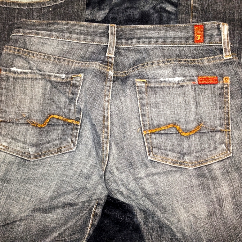 Flared distressed jeans